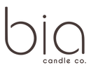 Minimalist modern logo for Bia Candle Co. featuring lowercase "bia" text in brown with "candle co." underneath.
