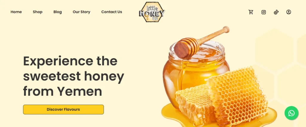 Little Honey UK homepage banner featuring a glass jar of honey and fresh honeycomb with the text Experience the sweetest honey from Yemen and a Discover Flavours button.